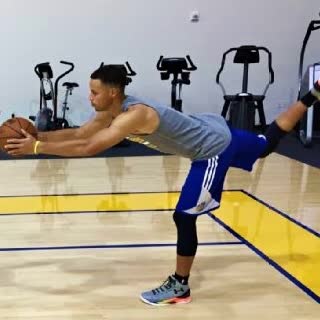 Basketball player doing a balance exercise